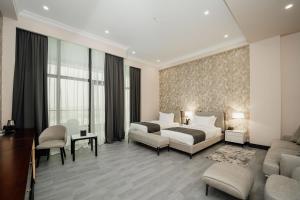 Voodi või voodid majutusasutuse Hills Resort Hotel toas