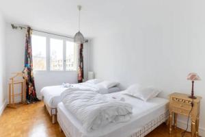 Posteľ alebo postele v izbe v ubytovaní HSH Saint-Charles André-Citroën Superbe appartement 5P