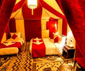 Postel nebo postele na pokoji v ubytování Original Luxury Camp