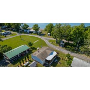 an aerial view of a park with a building at Shady Shores RV Resort & Campground 