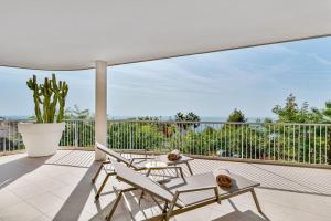Balkon lub taras w obiekcie Stylish apartment with oceanview