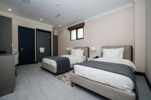 Voodi või voodid majutusasutuse Hills Resort Hotel toas