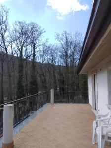 a balcony with a view of the mountains at Appartamento Diana in Roccaraso