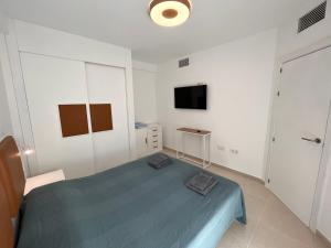 Telewizja i/lub zestaw kina domowego w obiekcie Casa Antonia con jacuzzi privado y solarium