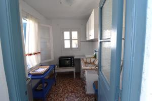 Kuchyň nebo kuchyňský kout v ubytování Yiayia's guesthouse