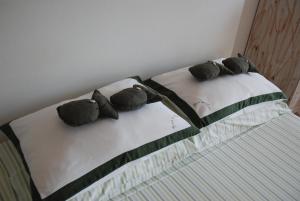 Llit o llits en una habitació de Beso del Viento (Adults Only)