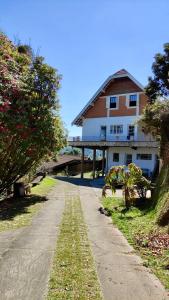 Κήπος έξω από το Recanto Dubieux Suítes