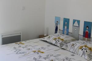 Ένα ή περισσότερα κρεβάτια σε δωμάτιο στο Comme à la maison