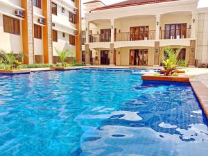 Kolam renang di atau dekat dengan Rafaella Sunset - Deluxe Room
