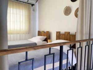 Кровать или кровати в номере Sunside Inn Hotel