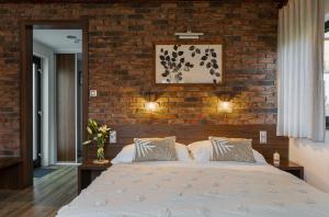 Кровать или кровати в номере Resort U Fořta