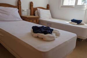 A bed or beds in a room at Spacious and peaceful apartment Jardin 2 Még 25 kép