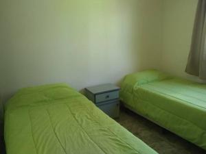 Katil atau katil-katil dalam bilik di Alquiler diario