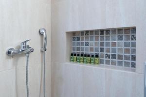A bathroom at Mar25 by Smart Cozy Suites - In the heart of Athens - 9 minutes from metro - Available 24hr