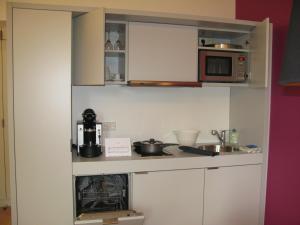 Cucina o angolo cottura di Key Inn Appart Hotel Parc de Merl