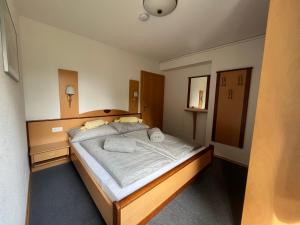 Posteľ alebo postele v izbe v ubytovaní Apartments Hohenberger Mallnitz - Mein Platz in den Bergen!