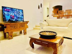 TV tai viihdekeskus majoituspaikassa Dolce Vita Caribe Villas
