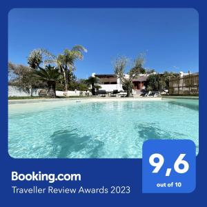 a picture of a swimming pool with the words travel review awards at Villa Sara - Villa con piscina in Marina di Ragusa