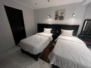 Voodi või voodid majutusasutuse Helio Cairo Hotel toas