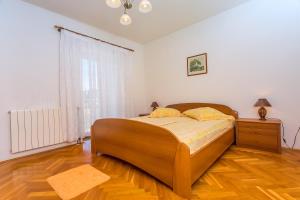 Postel nebo postele na pokoji v ubytování Vacation house Palma + 14 fotografií