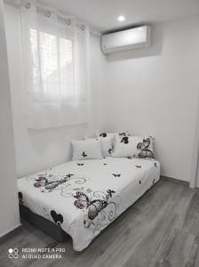 A bed or beds in a room at Casa Mario