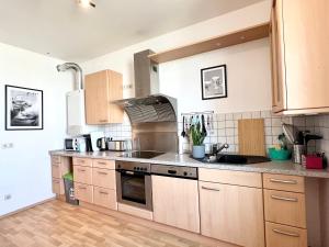 Køkken eller tekøkken på Großes Apartment Bremerhaven