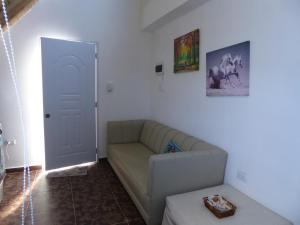 Posezení v ubytování CortLang Vacation Rentals, El Pueblito