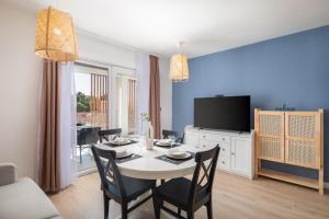 TV a/nebo společenská místnost v ubytování Kovač Family Suites