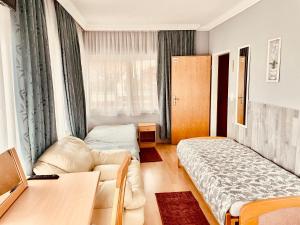 Postel nebo postele na pokoji v ubytování Villa Lux