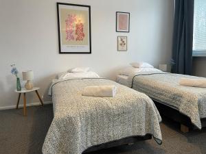 Postel nebo postele na pokoji v ubytování Apartamenty Cud Miód