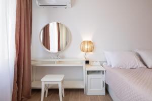 Postel nebo postele na pokoji v ubytování Kovač Family Suites