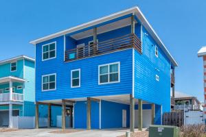 een blauw huis op het strand bij Big Blue in Port Aransas