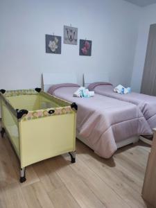 Letto o letti in una camera di Guest House Nonna Angela