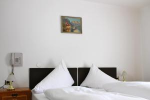 Postel nebo postele na pokoji v ubytování Gasthof Ölberg