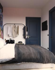 מיטה או מיטות בחדר ב-Lilium Maris Hotel