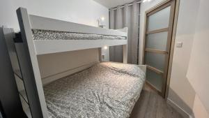 Posteľ alebo postele v izbe v ubytovaní Superbe appartement cosy - Plage des minimes