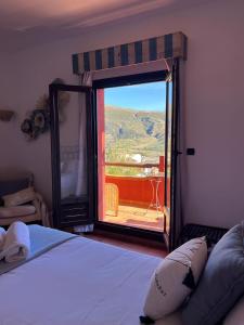Postel nebo postele na pokoji v ubytování Hotel Boutique Cerro del Sol Adults only recommended