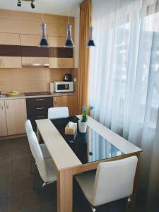 A kitchen or kitchenette at Apartment Mountain view - Stará Lesná