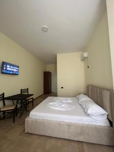 Letto o letti in una camera di Hotel Antik
