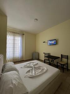 Letto o letti in una camera di Hotel Antik