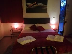 A bed or beds in a room at Sacripante