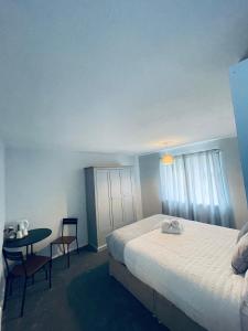 Postel nebo postele na pokoji v ubytování II comfortable room, Shared House