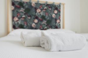 A bed or beds in a room at Easylife - Accogliente dimora con balcone