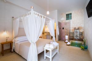 Ein Bett oder Betten in einem Zimmer der Unterkunft Masseria Rauccio