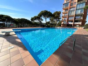 Bazén v ubytovaní Apartamento con piscina en Platja d'Aro alebo v jeho blízkosti