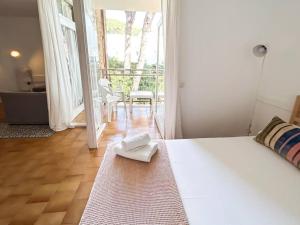 Posteľ alebo postele v izbe v ubytovaní Apartamento con piscina en Platja d'Aro