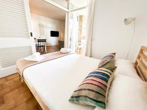 Posteľ alebo postele v izbe v ubytovaní Apartamento con piscina en Platja d'Aro
