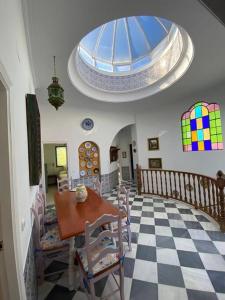 Posedenie v ubytovaní Casa Las Vidrieras