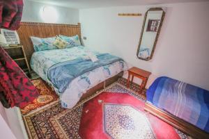 Postel nebo postele na pokoji v ubytování Riad Fes Basma