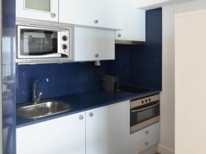 Kuchyňa alebo kuchynka v ubytovaní Apartamento con vistas increíbles al mar